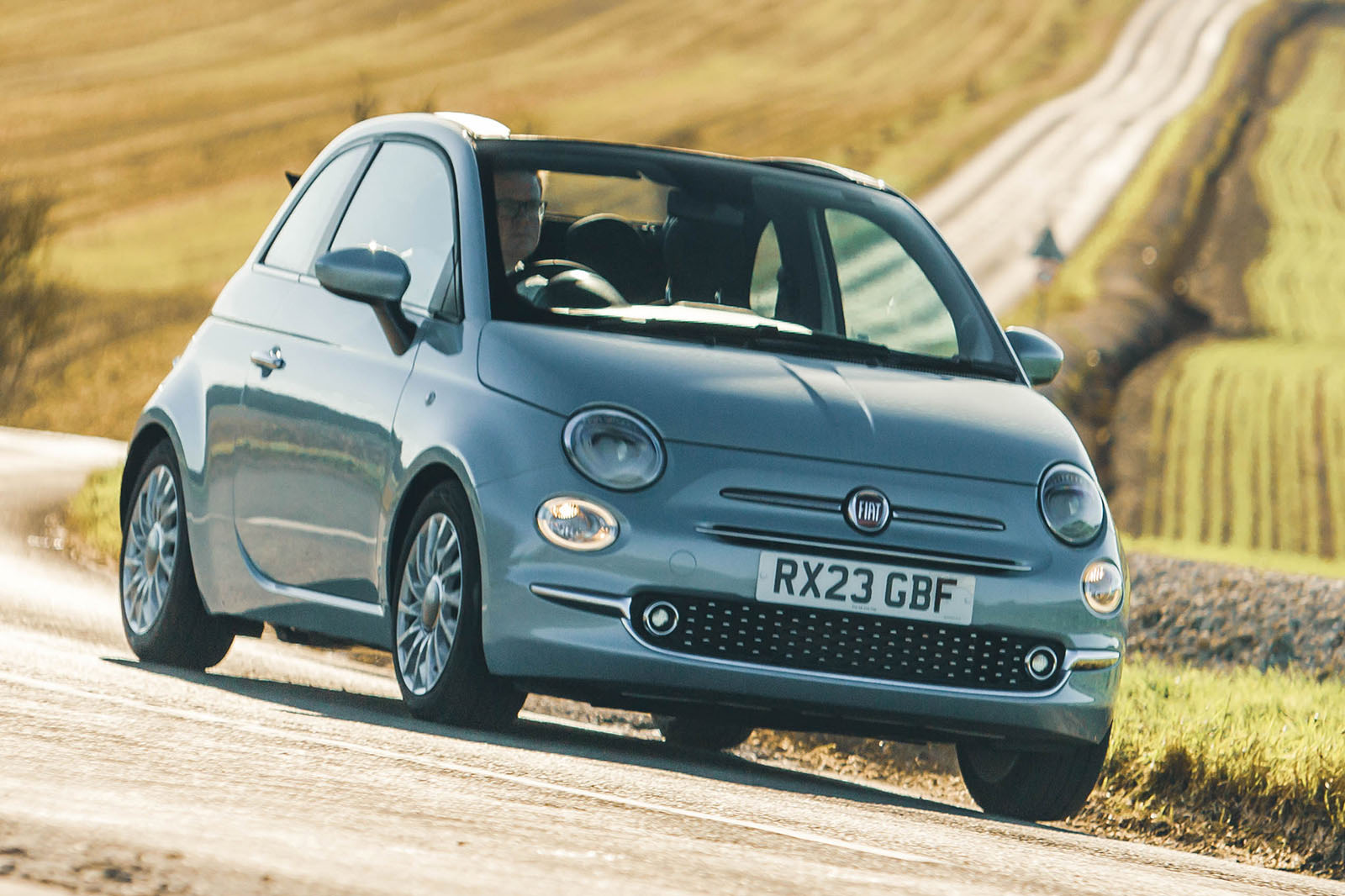 fiat 500c hybrid review 2024 01 cornering front