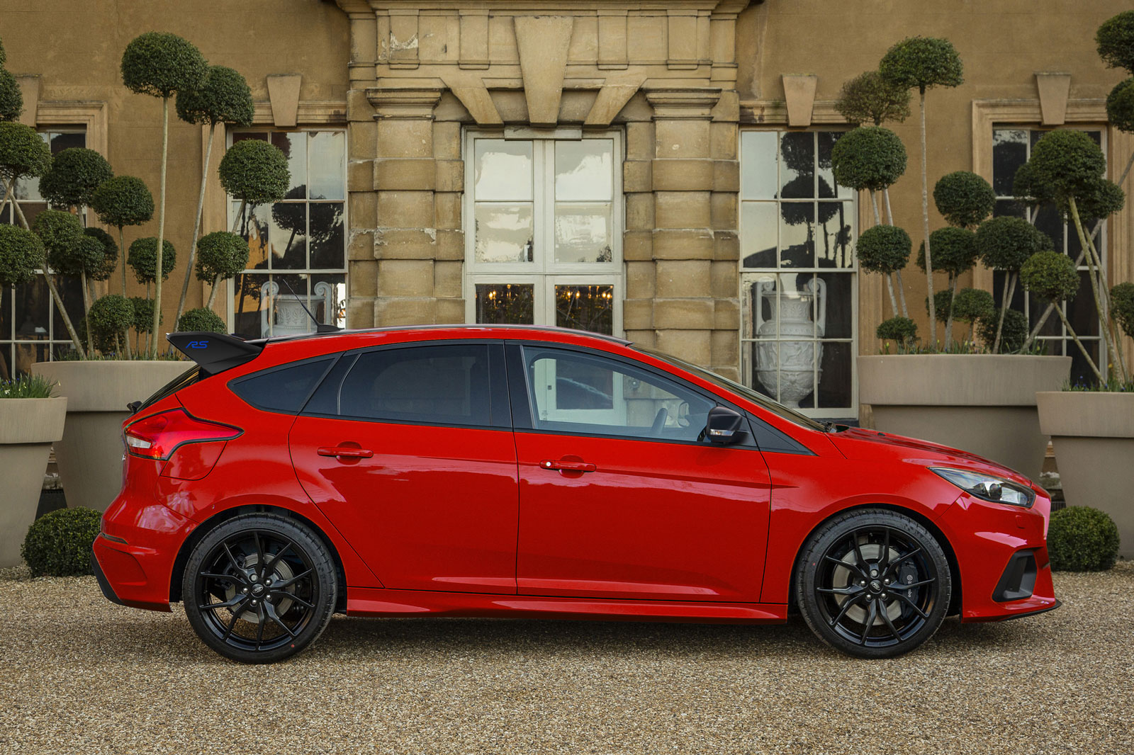 Red edition features grey brake callipers behind black cast alloys