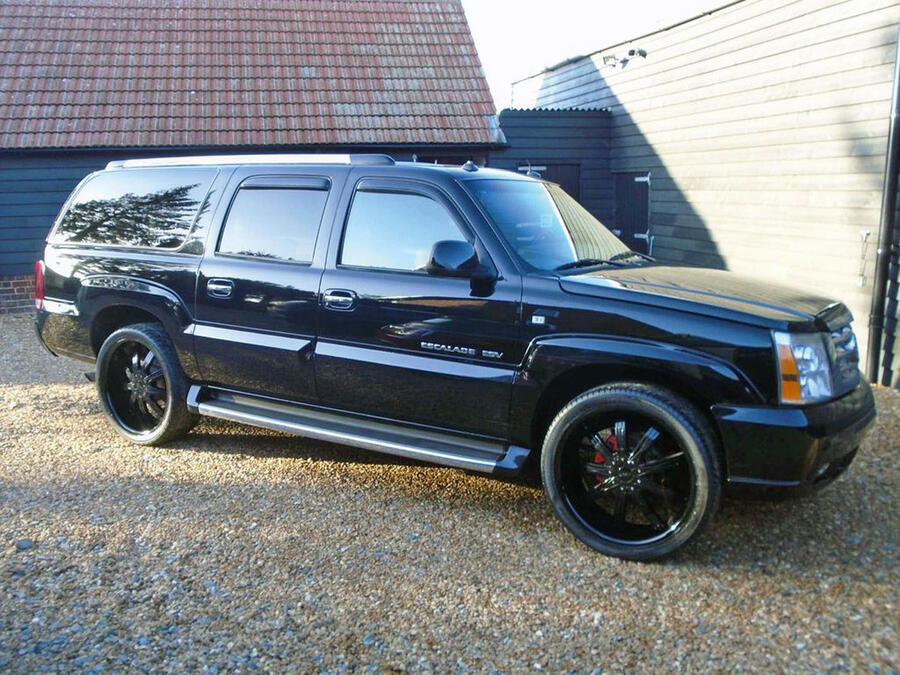 2 Cadillac escalade esv stationary side