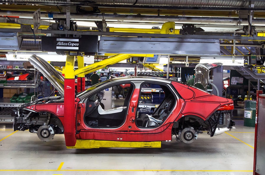 Partly assembled car in factory