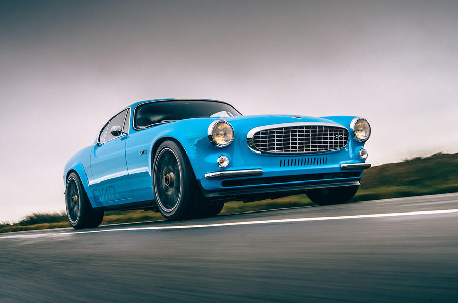 Cyan Volvo P1800 drive - hero front